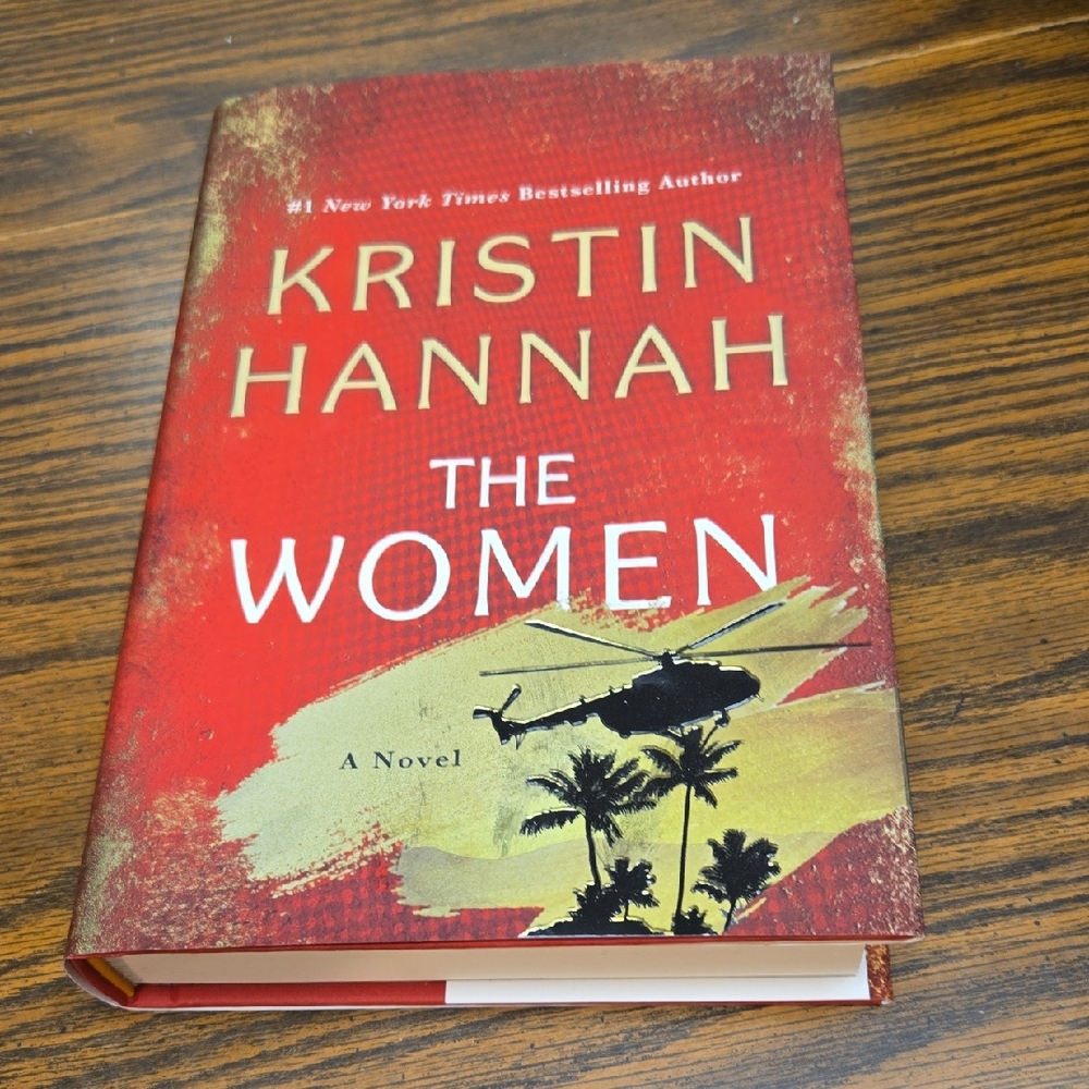 Red Hardcover Novel 'The Women' by Kristin Hannah